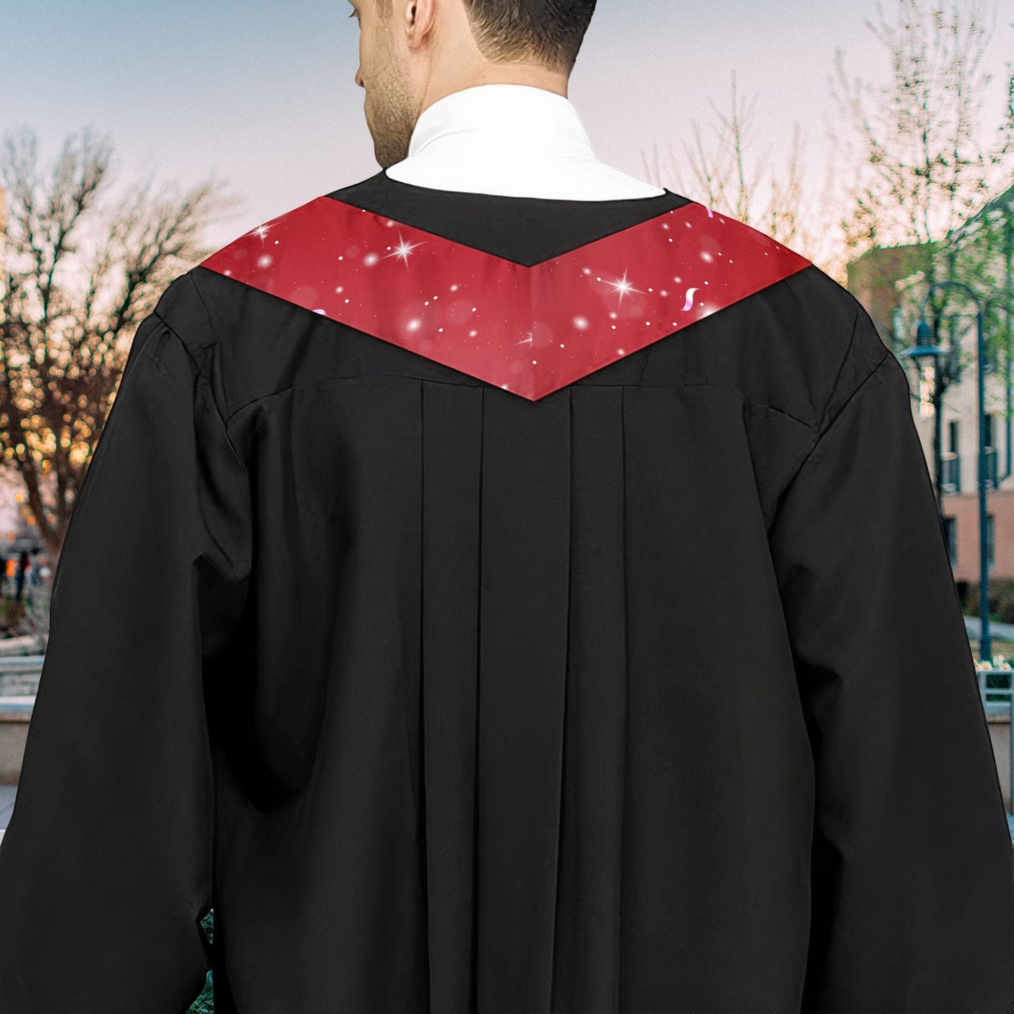 Red graduation stole with text on a black graduation gown. Satin/polyester blend graduation stole for graduation.